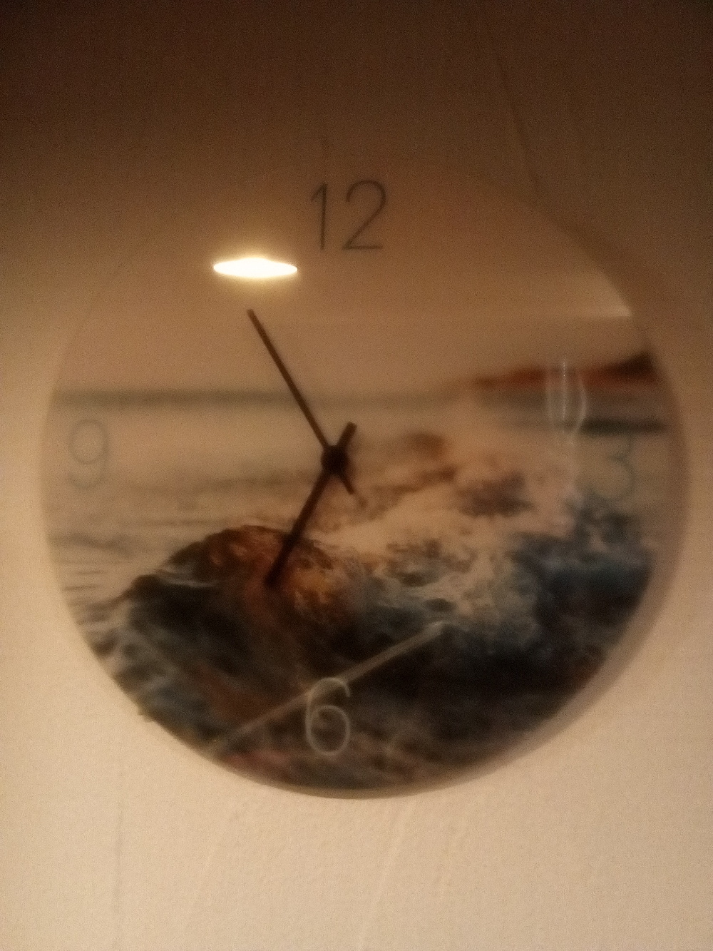 Uhr mit Bildzifferblatt Welle
